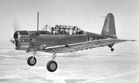 Painting of an old aircraft flying.